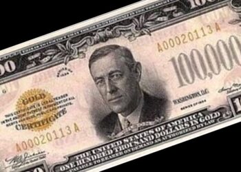Billete antiguo de alta denominación con retrato grabado y sello dorado sobre fondo oscuro, símbolo de valor y dinero; Caché de Coldplay: descubre cuánto cobran por sus conciertos