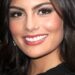 Retrato en primer plano con sonrisa y maquillaje elegante, Ximena Navarrete: Descubre de dónde es la famosa Miss Universo