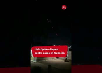 La impactante mansión de Ovidio Guzmán: secretos y revelaciones en una imagen nocturna de un helicóptero disparando sobre casas en Culiacán
