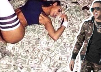 Persona con ropa de camuflaje y joyas junto a montones de billetes y una mujer sobre dinero, ¿Cuánto cobra este artista por concierto? Descubre sus ingresos reales