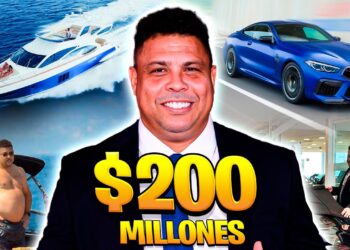 Hombre sonriente en montaje promocional con yate, coche deportivo, concesionario y la cifra $200 millones que evoca lujo y patrimonio.