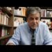 Hombre sentado en un despacho rodeado de libros, Sueldo de Quim Torra: ¿Cuánto gana realmente el expresidente?
