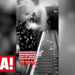 Dos niños en un estudio de grabación junto a una mesa de mezclas con los rostros pixelados