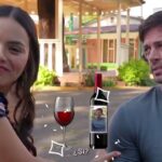 William Levy y sus parejas: secretos y romances que sorprenden en una escena al aire libre con dos personas conversando frente a una copa y una botella de vino.