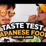 Descubre dónde vive Carlos Sainz: su hogar de lujo en Madrid en una escena de prueba de comida japonesa con dos hombres degustando sushi.