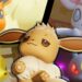 Familia de Eevee: descubre sus evoluciones y secretos encantadores, Eevee central rodeado por Flareon, Jolteon, Umbreon y Sylveon.
