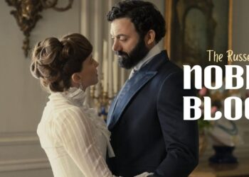 Pareja vestida de época en un salón elegante, mirada íntima y tensión dramática; Los secretos oscuros de la temporada 3 de The Gilded Age que nadie se atreve a contar.