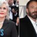 Tres personas vestidas de gala en alfombra roja, una pareja posando junto a una mujer de cabello canoso ante fotógrafos