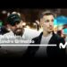 Dos hombres sentados en un plató de televisión con iluminación y pantallas de fondo, logo de M+ visible — jue b4XnAR4