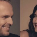 Dos personas sonrientes en primer plano, mirada cómplice y luz cálida — Hijos de Miguel Bosé: secretos y revelaciones que no conocías