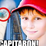 Niño con gorra roja y sonrisa junto a una estructura tubular alta señalada con un círculo y flecha; Descubre quién es la sorprendente novia de Tammy Slaton de los 1000-Lb Sisters y lo que nadie te ha contado sobre su relación