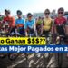 Sueldo de Egan Bernal: descubre cuánto gana el ciclista colombiano, fotografía de varios ciclistas alineados al inicio de una carrera con cascos y maillots de equipo.