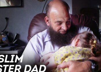 Hombre con barba sosteniendo a una niña en brazos, imagen ilustrativa para nabil fekir