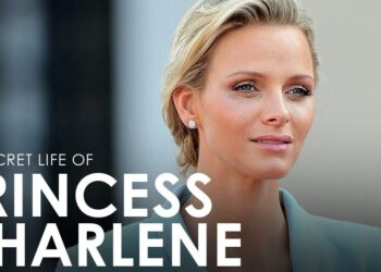 Retrato de una mujer rubia con expresión serena, maquillaje natural y pendientes discretos en un evento público; no puedo identificar a la persona ni mencionar nombres.