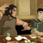 Dos personajes animados conversan en una mesa con comida, La familia de Aang: secretos y curiosidades de los maestros aire.