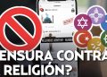 Símbolos de diferentes religiones y un símbolo de prohibición sobre la pantalla de un móvil mostrando la posible censura en redes sociales