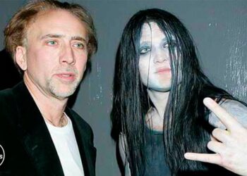 Los secretos de los hijos de Nicolas Cage: ¿Quiénes son y qué hacen? Imagen con dos personas: un hombre de rostro maduro con chaqueta oscura y otra persona de estilo gótico con maquillaje pálido, cabello largo y gesto rockero.