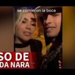 Dos personas muy cerca en un video nocturno con texto superpuesto que alude a un beso